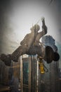 Silhouette ofSkyscraper window cleaner behind a wet glass in Doha, Qatar Royalty Free Stock Photo