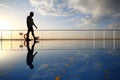 Silhouette of old man walking throught deck Royalty Free Stock Photo