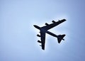 High flying United States Air Force Boeing B-52 Stratofortress in silhouette. Royalty Free Stock Photo