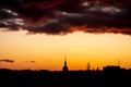 Silhouette of Ostrava-Poruba city hall Porubska radnice during beuatiful sunset with dark clouds