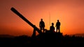 Silhouette and over the sunrise background cannon soldiers team in Thailand Royalty Free Stock Photo