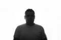 Silhouette of overweight man overweight in profile posing on white background. Close up. place for text