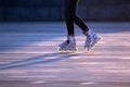 Silhouette pairs of legs on roller skates