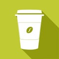 Silhouette of paper cup coffee with long shadow isolated on green