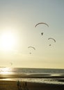 Silhouette of para gliding at sunset sky with sea Royalty Free Stock Photo