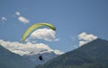 Silhouette of a paraglider and mountains. Interlaken, Switzerland.