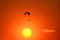 Silhouette paramotor flying