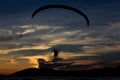 Silhouette paramotor / paraglider flying on the sky with seavie Royalty Free Stock Photo