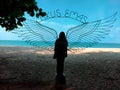 Silhouette of people with angel wings at Tikus Emas Beach in Sungailiat Bangka, Indonesia
