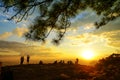 Silhouette of people enjoyed sunset view at the mountain top. Royalty Free Stock Photo