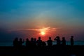 silhouette family meeting and looking sunset on beach Royalty Free Stock Photo