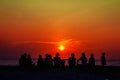 silhouette family meeting and looking sunset on beach Royalty Free Stock Photo