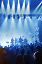 Silhouette People Group at Music Concert. Cheering Crowd at a Concert in Front of Bright Lights. Vintage Style, Happy People Royalty Free Stock Photo