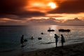 Silhouette People and Jet-ski with sunset background at Bang sean beach