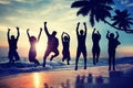 Silhouette People Jumping with Excitement on a Beach Royalty Free Stock Photo
