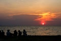 silhouette people meeting look sunset sky on beach