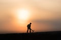 Silhouette people mining on sky sunset background.