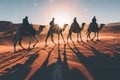 Silhouette people riding camels in desert native tuareg arabic african person Sahara wildlife tourist attraction Dubai Royalty Free Stock Photo