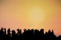 Silhouette of people taking pictures against sunset sky Royalty Free Stock Photo