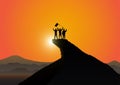 Silhouette of people on top of mountain with cheerful on golden sunrise background, success, achievement and winning concept Royalty Free Stock Photo