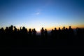 Silhouette of people and tourist during a beautiful mountain su