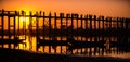 Silhouette of people on U Bein bridge at sunset in Amarapura. Mandalay, Myanmar Royalty Free Stock Photo