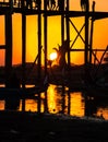 Silhouette of people on U Bein bridge at sunset in Amarapura. Mandalay, Myanmar Royalty Free Stock Photo