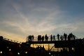 Silhouette of people on upper floor