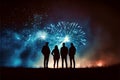 Silhouette of people watching amazing colorful fireworks display Royalty Free Stock Photo