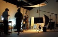 Silhouette of people working in production studio.