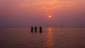 Silhouette of peoples at Bagan Lalang Beach during the sunset in the evening