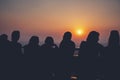 Silhouette Peoples waiting for sunset Tourist spot sunset scene Royalty Free Stock Photo