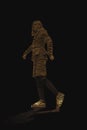 Silhouette of a person made in stripes, digital avatar, artificial intelligence, halogram of a walking person in space