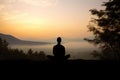 silhouette of a person meditating in nature serenity associated with yoga meditation Generative AI