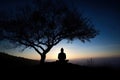 silhouette of a person meditating in nature serenity associated with yoga meditation Generative AI