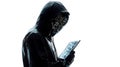 Anonymous hacker silhouette with tablet Royalty Free Stock Photo