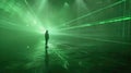 Silhouette of a person standing in green laser lights Royalty Free Stock Photo