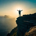 Silhouette of a person standing on a mountaintop