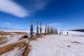 Silhouette of person takes photo of sacred buryat place on Olkhon island, lake Baikal, Russia