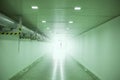 Silhouette of person in underpass tunnel in green