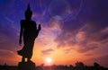 Silhouette photo.Buddha statue standing and show hand Royalty Free Stock Photo