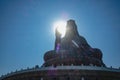 Silhouette photo of Guanyin buddha or `Goddess of Mercy ` statue on top of Xiqiao mountain Royalty Free Stock Photo