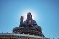 Silhouette photo of Guanyin buddha or `Goddess of Mercy ` statue on top of Xiqiao mountain