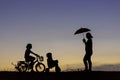 Mother and daughter ride bicycle