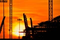 Silhouette photo during sunset, container lifting crane in Laem Chabang deep sea port