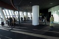 Silhouette photo of tourists in the Tokyo Sjytree dock who are look out through window glasses to see Fuji mountain and Tokyo city