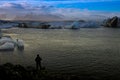 Silhouette photographer at Jokulsalon glacial lagoon