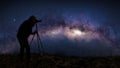 Silhouette of a photographer shooting the milky way