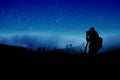 Silhouette of photographer shooting night stars Royalty Free Stock Photo