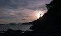 Silhouette of a photographer or traveler using a professional DSLR camera,photographer take sunset photo scenery view